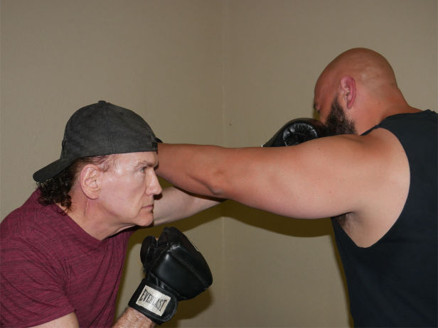 Mike Akins and Shayne Pearman boxing.